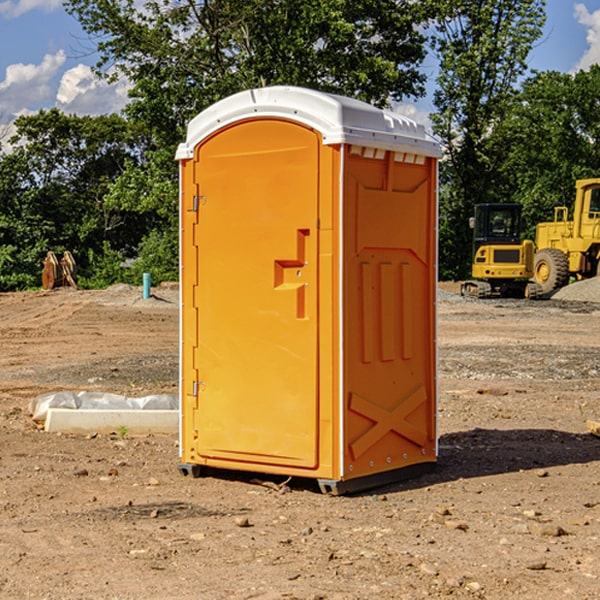 what is the cost difference between standard and deluxe portable toilet rentals in Oak Run